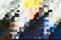 Workmen with hard hats on