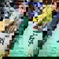 A Compostable Carrier Bag Supplied To The Coop By Bunzl Retail Supplies