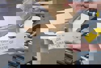 Sustainable Packaging Products in box made of grass